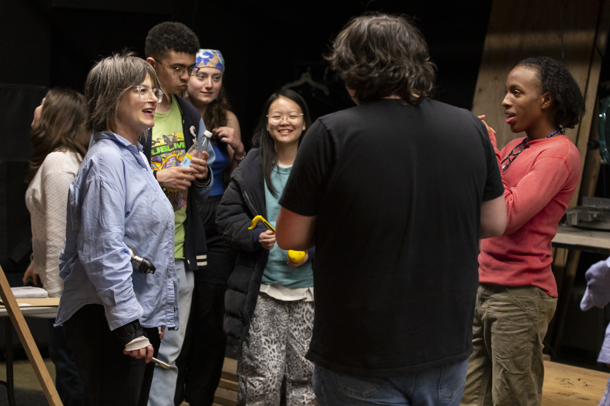Sibyl Kempson standing with a group of students
